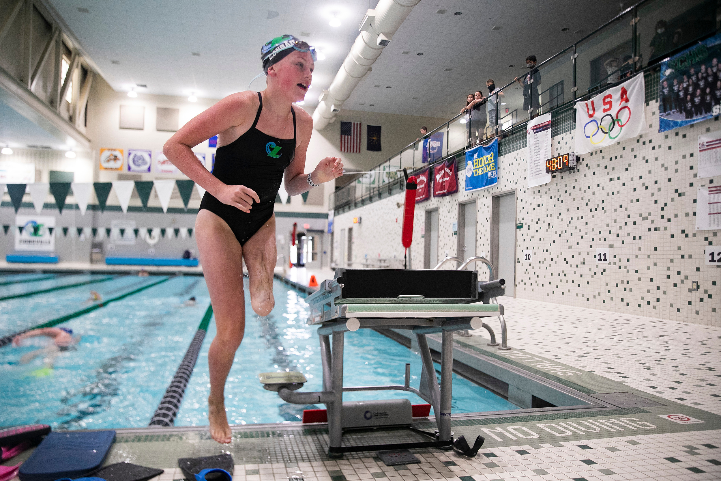 Brittany Conrad, 11, gets out of the Zionsville Aquatic Center pool Monday, June 21, 2021, in Zionsville. Conrad lost her leg in a lawn mowing accident, but she has not let it stop her passion for swimming. She is preparing for her first Junior National.